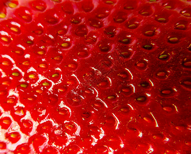 草莓纹理背景种子皮肤食物宏观水果浆果红色背景图片