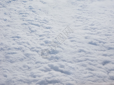 从飞机背景中看到的云白色旅行天空运输航班飞行背景图片