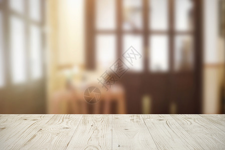 清空的木板桌 上面是咖啡馆或休息室模糊抽象摘要背景图片