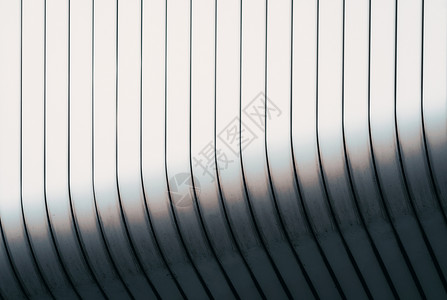 现代建筑的灰色弧形墙图案线条平行线空白盘子几何学建造背景条纹曲线背景图片