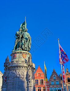 布鲁日 比利时市场广场雕像游客纪念碑历史旅行市集旅游建筑学地标建筑雕塑背景图片