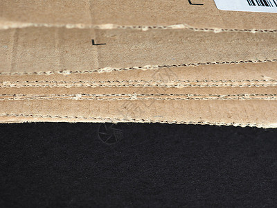 棕色纸板盒邮政纸板船运邮资电子商务邮件瓦楞包装盒子背景图片