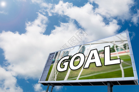 goallead 记分牌上的文字“GOAL” 蓝天空背景 体育概念背景