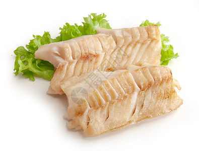 带生菜的烤鳕鱼肠盘子海鲜腰部饮食绿色食物鱼片健康高清图片