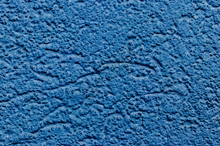 蓝色石墙的纹理材料石头建筑学建筑墙纸石膏水泥背景图片