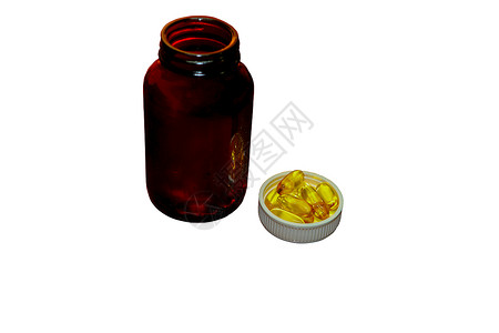 塑料白帽上的药片和白色背景上分离的医用玻璃瓶 背景散焦背景图片