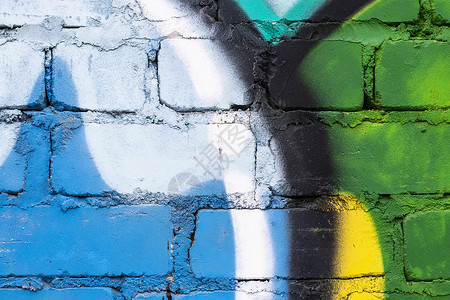 在砖墙纹理上涂鸦绘画建筑创造力街道墙纸艺术品艺术背景图片