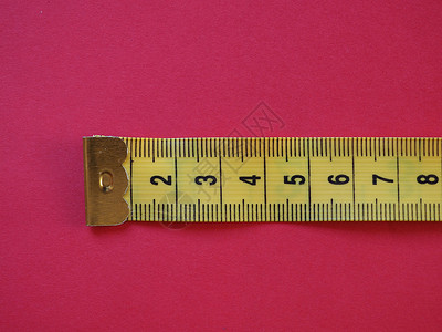 有量单位的标尺r线规技术仪表乐器测量公制统治者厘米工具红色背景图片