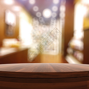 空木制圆桌和产品预产期的模糊背景阴影推介会咖啡店木板石头展示房间商业橡木木头背景图片