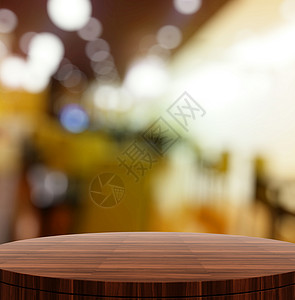 空木制圆桌和产品预产期的模糊背景店铺零售木头石头桌子阴影橡木咖啡店推介会房间背景图片