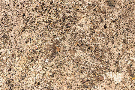 黄色石墙的纹理碎石空白风化建筑学岩石建筑砂砾背景图片