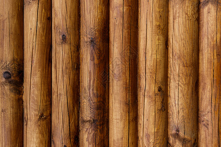 以原木为背景的木墙木板黄色木材粮食硬木控制板材料桌子衰老背景图片