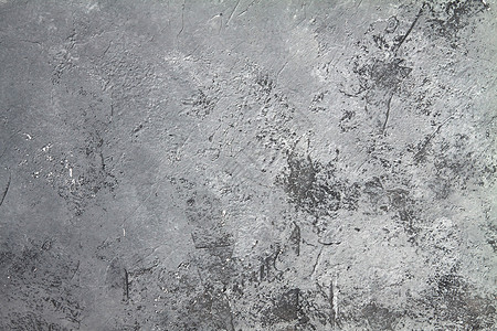 带有磨损和黑色飞溅的混凝土深灰色背景 在 grunge 风格的纹理墙纹理石膏艺术行为石头材料水泥划痕违规底漆墙纸背景图片