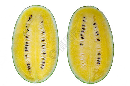 黄色的西瓜黄西瓜食物西瓜黄色绿色小吃白色水果背景