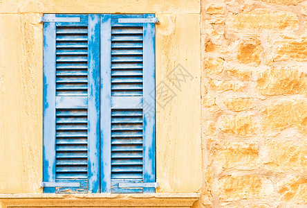 蓝色墙体蓝色蓝玻璃窗百叶窗背景