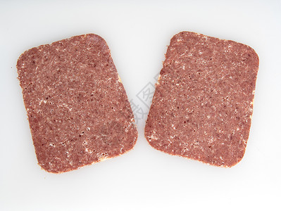 玉米牛肉切片白色红色食物背景图片