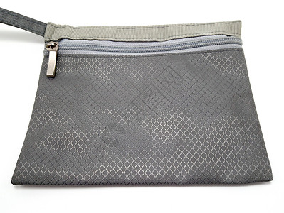 灰色便携式邮袋织物小袋压缩项目拉链背景图片