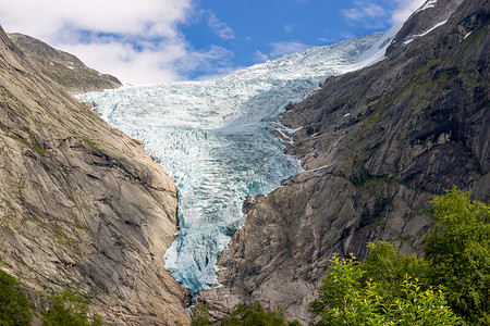 挪威冰川挪威的熔化布里克斯达尔冰川 特写假期国家危机风景灾难溪流洪水蓝色生态地标背景