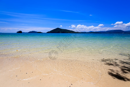 有金沙和海的海滩水晶风景海洋气候海景白色假期旅行蓝色天空背景