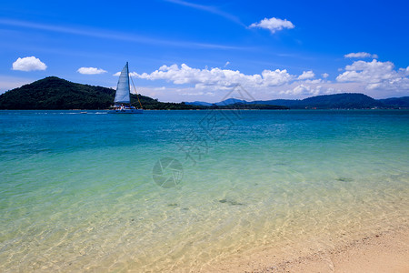 透明金沙素材有金沙和海的海滩风景旅游天空旅行水晶海景蓝色白色气候热带背景