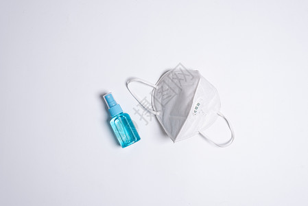 保护COVID19 白面罩和清洁手用设备g玻璃细菌呼吸感染清洁剂疾病面具肥皂警告药品背景图片