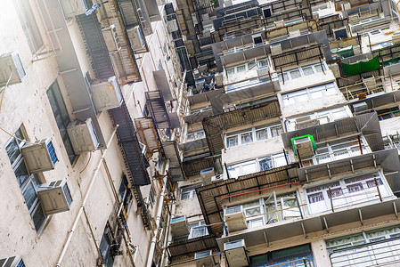 香港的民居区 人口拥挤的住宅区摩天大楼房子贫民窟建筑学问题住宅小区住房建造业办公楼开发背景图片
