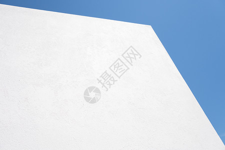 蓝色天空背景的白纹白色混凝土背景 墙壁漆白背景图片