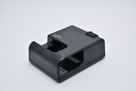 黑色数字单镜头反射DSLR电池充电器电子产品品牌塑料电子力量充值技术背景图片