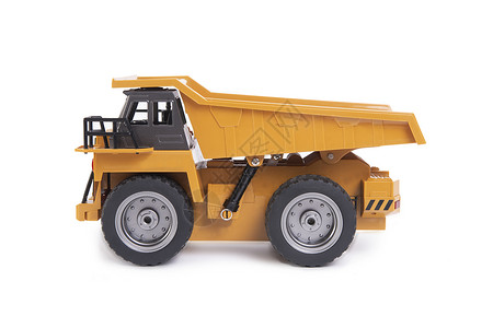 白色背景的黄色卡车玩具模型背景图片