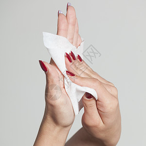 用湿巾洗手纸巾健康洗涤白色女性女士手指去除剂卫生指甲背景图片