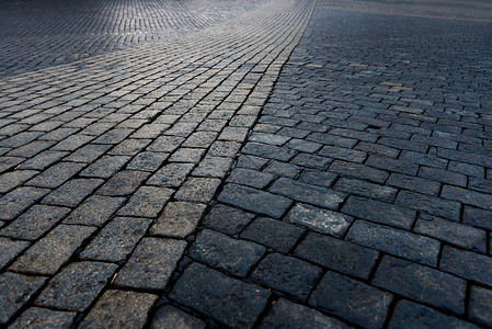 鹅卵石铺的路石头人行道近身照片铺路人行道小路鹅卵石路面平铺街道石头正方形花岗岩背景