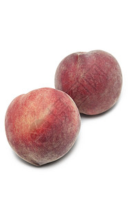 白色背景的两桃桃生产水果健康饮食营养影棚静物食物圆圈圆形背景图片