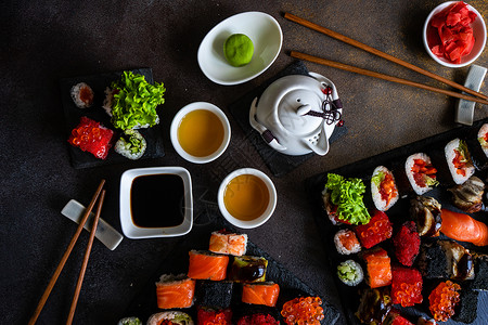 寿司 生生和寿司胶卷贴在石板上石头鱼片海鲜鳗鱼筷子食物杯子执事大豆环境背景