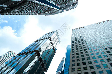 现代商业摩天大楼 高楼 建筑和建筑建筑学经济学城市办公室企业银行太阳酒店蓝色经济背景图片