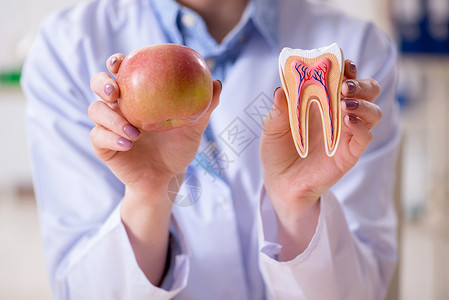 牙科牙医练习牙齿模型的工作症状男人药品医院检查水果保健治疗维生素乐器背景图片