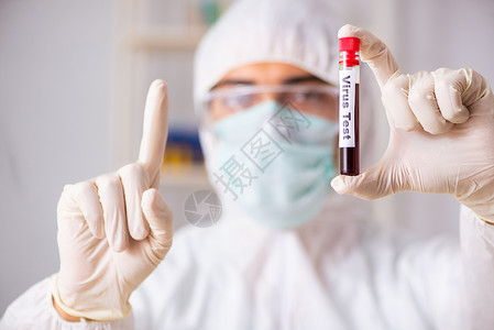 年轻英俊的实验室助理 在医院验血样本银行测试管子微生物科学家援助诊断化学品管道男人背景