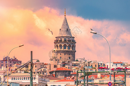 土耳其伊斯坦布尔日落时加拉塔塔塔背景