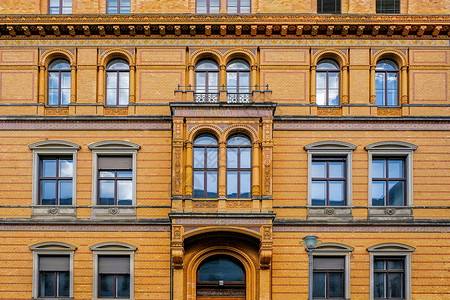 波尔图翟柏林德国柏林的古老房屋外墙窗型模式办公室财产旅行阳台城市蓝色建筑学框架历史性商业背景