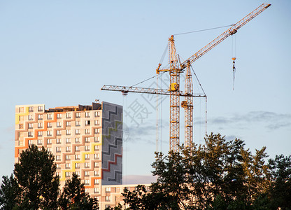 建筑工地住房蓝色建筑学项目财产起重机技术公寓住宅城市背景图片