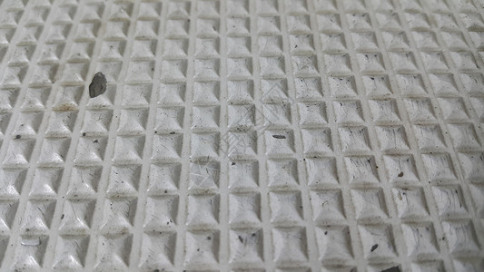 白色3D几何形状的地板瓷砖灰色颜色近距离材料路面石头地面城市墙纸石膏水泥粮食岩石背景图片