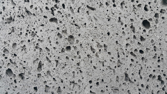 具有深灰孔形状的灰色地板背景白色建筑学墙纸空白路面地面材料黑色石头水泥背景图片