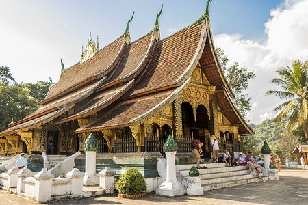 土主庙老挝的寺庙和尚增值税世界之旅旅行者文化观光建筑游客宗教主庙背景