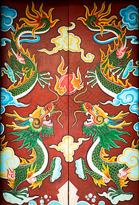龙纹身装有对称龙画的多彩门背景