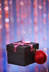 圣诞节礼物红色静物影棚惊喜摄影圣诞礼物庆典前景丝带背景图片