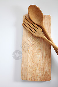 烹饪untensil木板钢包木头切菜板用具项目厨房勺子厨具棕色背景图片
