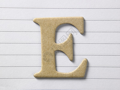 e字母e打字稿棕色回收宏观电子对象英语材料背景图片