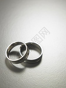 戒指白色周年圆圈珠宝仪式火花金属订婚结婚婚礼背景图片