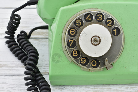 绿色的旧旧回转拨电话背景