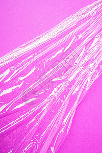 粉红背景的拉伸包装塑料 最小创造性布局高清图片
