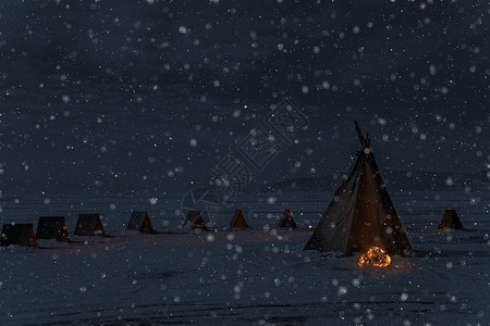 雪火冬季降雪和露营帐篷 有营火 夜光照片背景